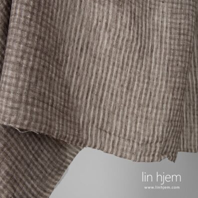 Vasket 100% linstoff i ruter.