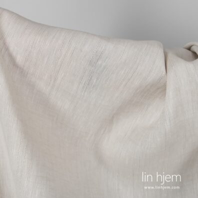 Gulaktig brun farget 100% linstoff.