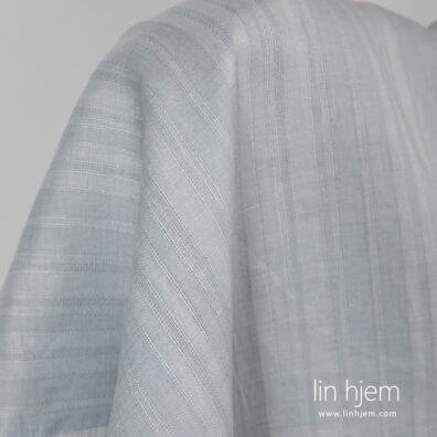 100% linstoff i grå farge.