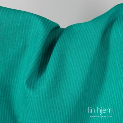 Grønt stripete linstoff.