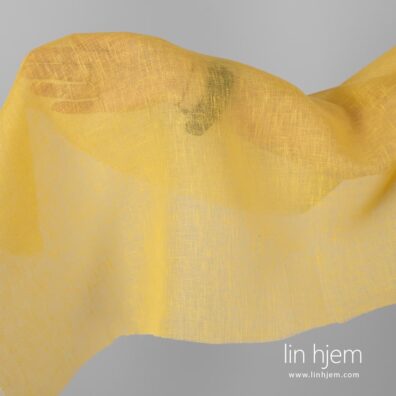 Gjennomsiktig gult linstoff.