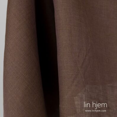 100% linstoff i lilla-grønn farge.