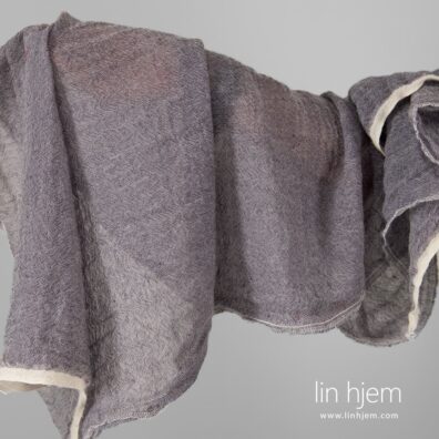 Lin-ull lilla vasket stoff.