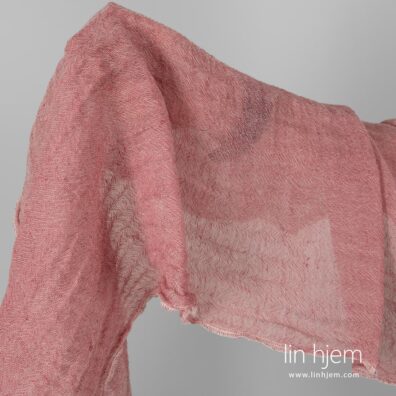 Lin-ull vasket rosa stoff.