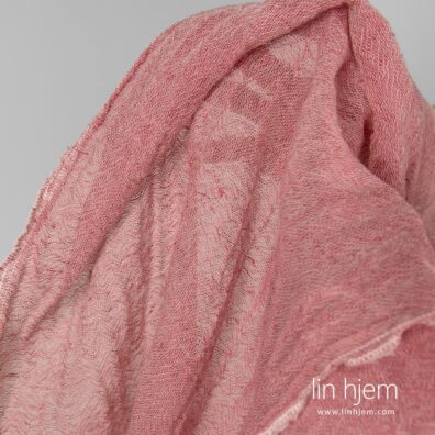 Rosa farget vasket lin-ull stoff.