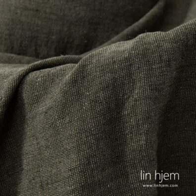 Pledd i grønn farge.