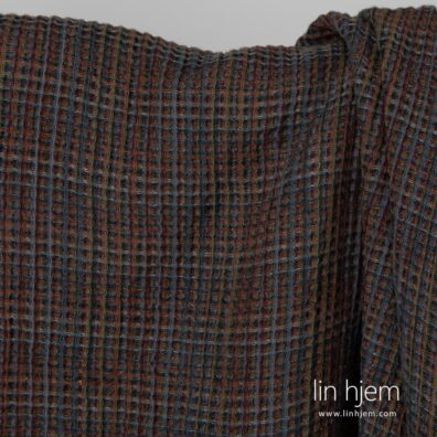 Fargerikt vasket vaffel halvlin stoff.