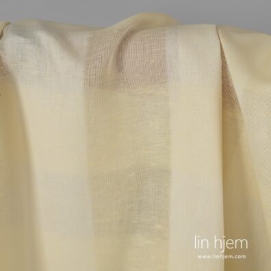 Stripete gulaktig halvlin stoff.