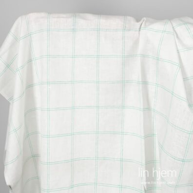 Grønt rutete linstoff.