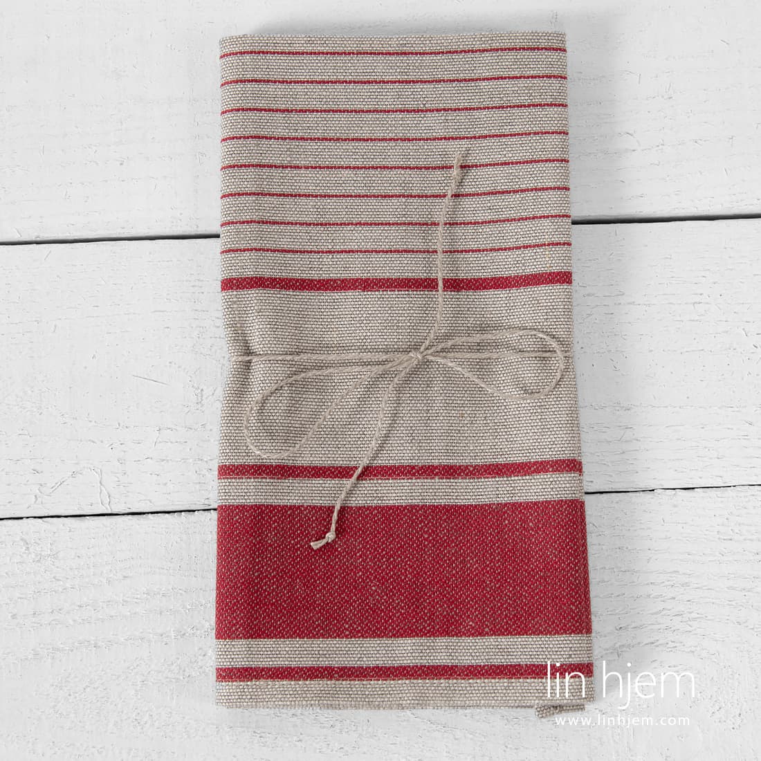 Håndkle med røde striper.