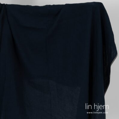 Vasket blått svart linstoff.