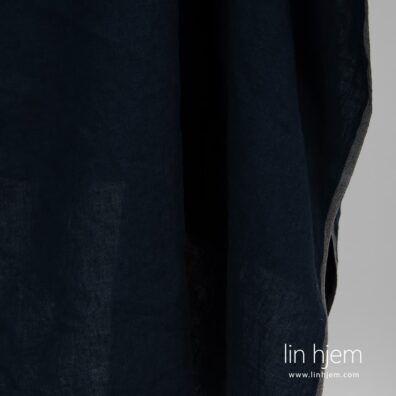 Vasket linstoff i svart-blå farge.