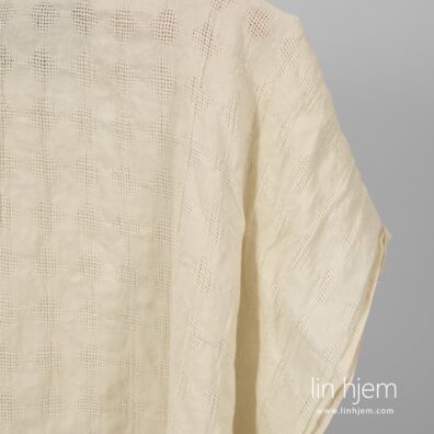 Gulaktig vasket linstoff.