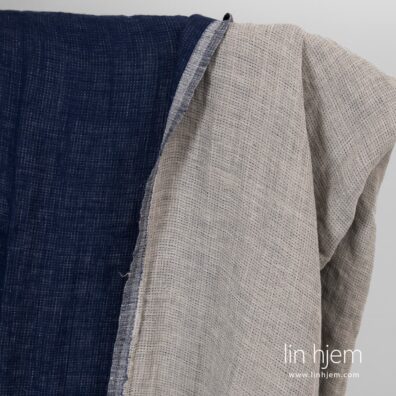 Tosidig blått-grått linstoff.