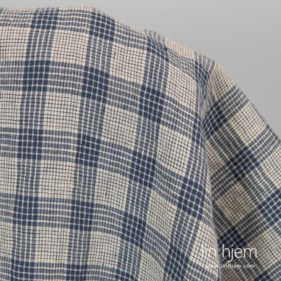 Vasket 100% linstoff i gulaktig blå ruter.