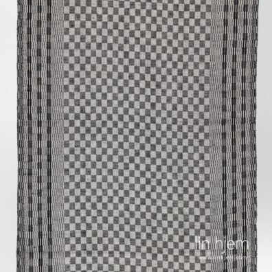 Svart rutete halvlin stoff.