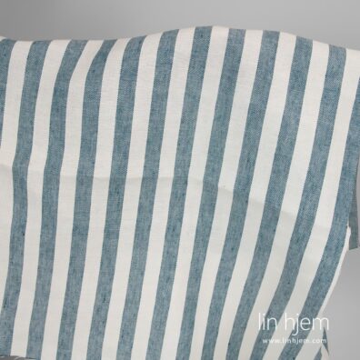 Linstoff i turkis farget striper.