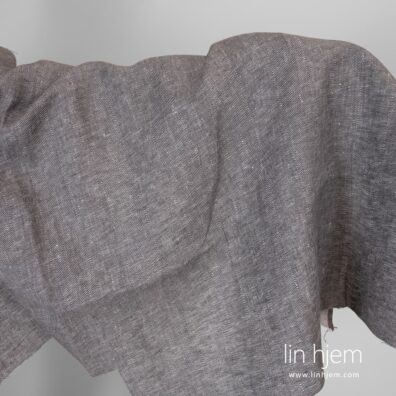 Grått gran mønstret linstoff.