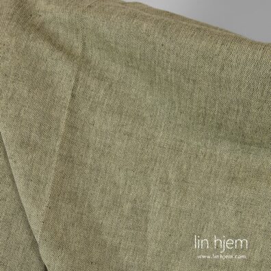 Grønt melange halvlin stoff.