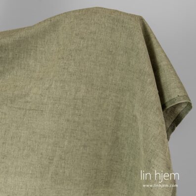 Lin-bomulls stoff i grønn farge.