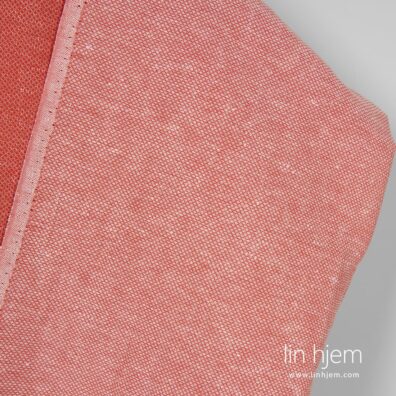 Lin-bomulls stoff i rød farge.