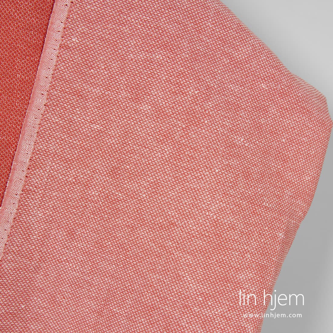 Lin-bomulls stoff i rød farge.