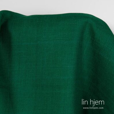 Hvitt stripete grønt linstoff.