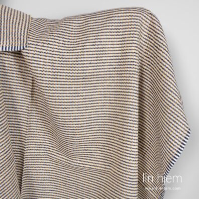 Linstoff i gule og blå ruter.