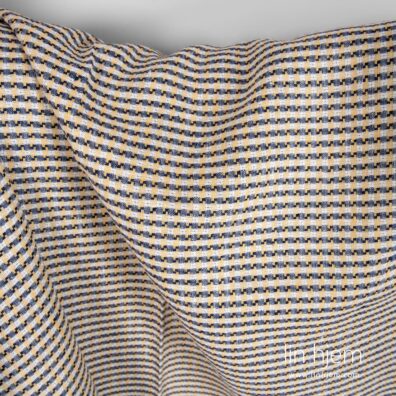 Gult-blått rutete linstoff.