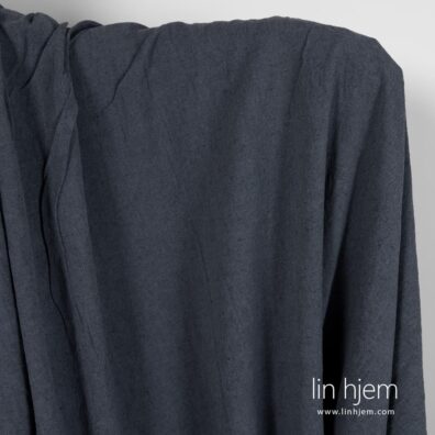 Bredt vasket halvlin stoff blått-grått.