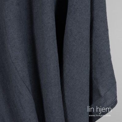 Blått-grått vasket halvlin stoff.
