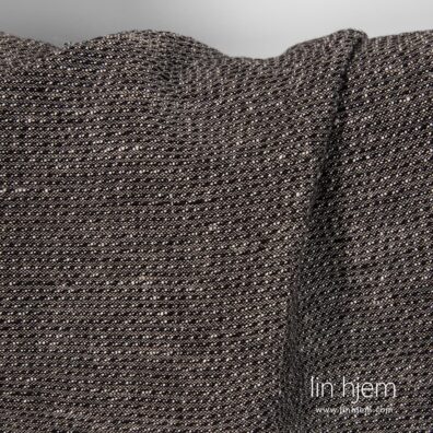 Mønstret svart vasket halvlin stoff.