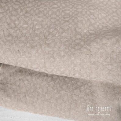 Vasket lin-ull stoff i grå farge.