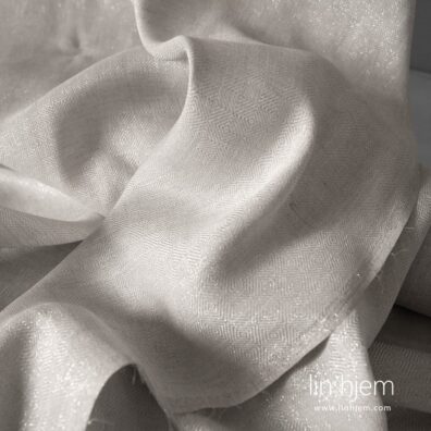 Grå farget lin-polyester stoff.