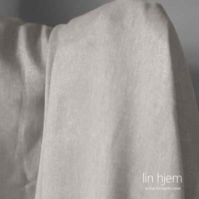 Skinnende stoff av lin polyester.