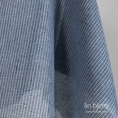 Blått linstoff i ruter.