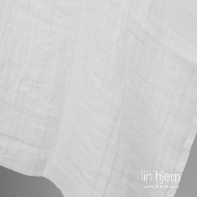 Rutete vasket hvitt linstoff.