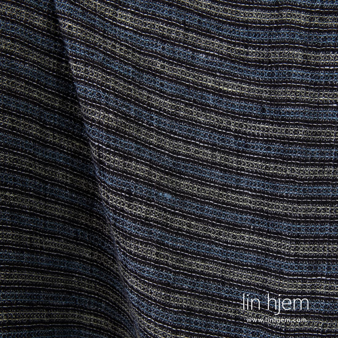 Svart-blått stripete vaffel linstoff.