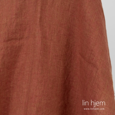 Melange rødt-brunt linstoff, vasket.