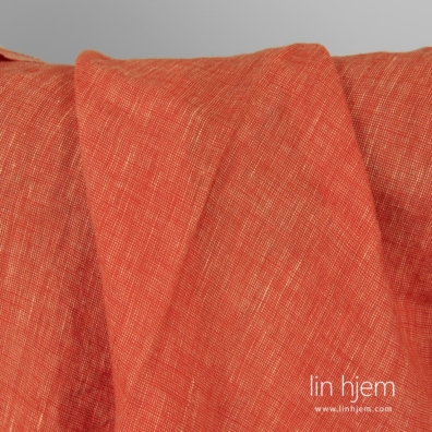 Melange gulaktig rødt linstoff.