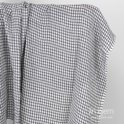 Rutete hvitt-svart vasket linstoff.