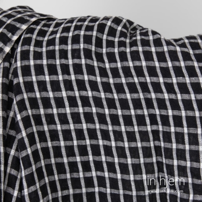 Svart-hvitt rutete linstoff.