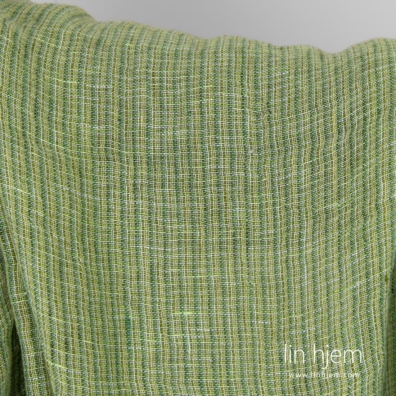 Grønt gjennomsiktig rutete linstoff.