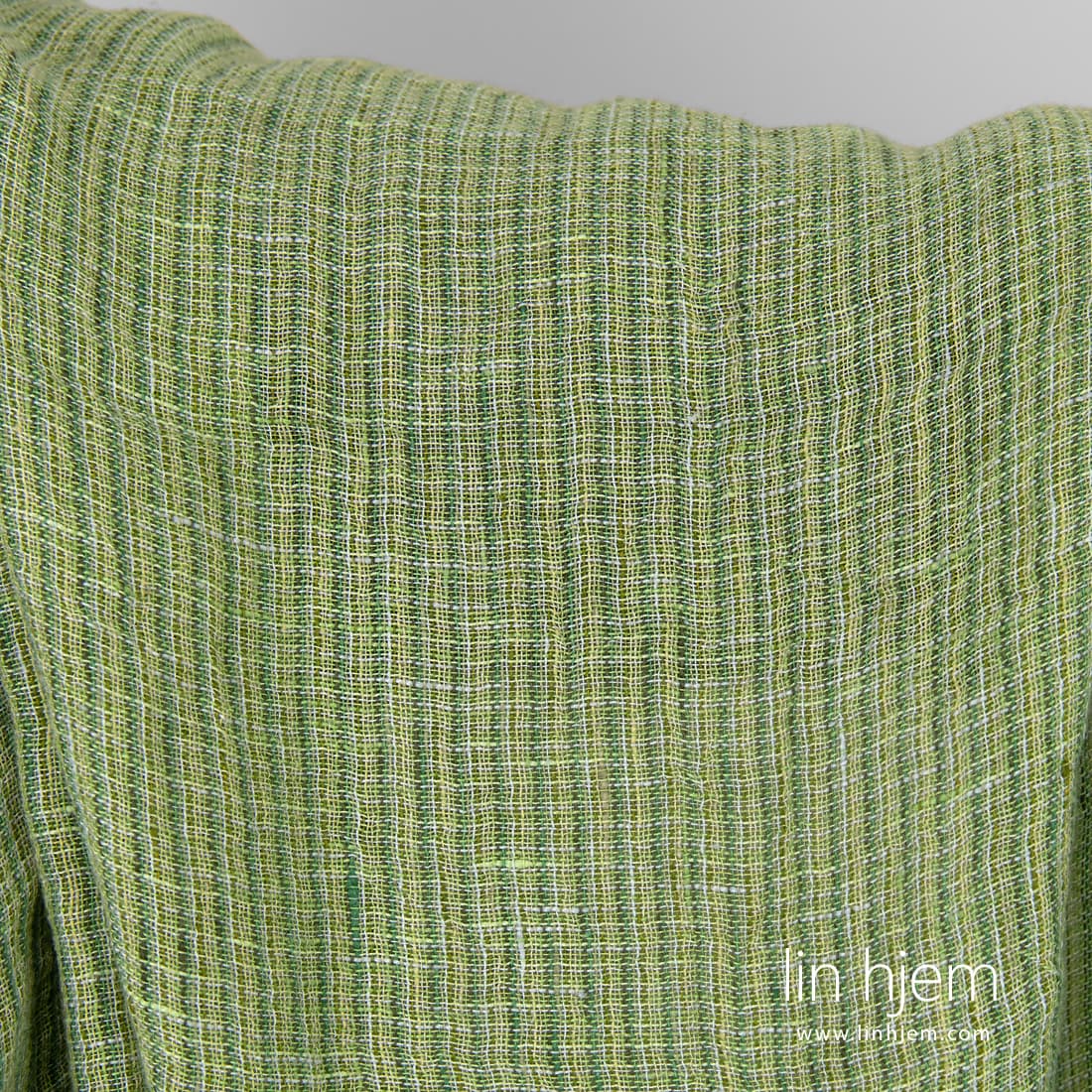 Grønt gjennomsiktig rutete linstoff.
