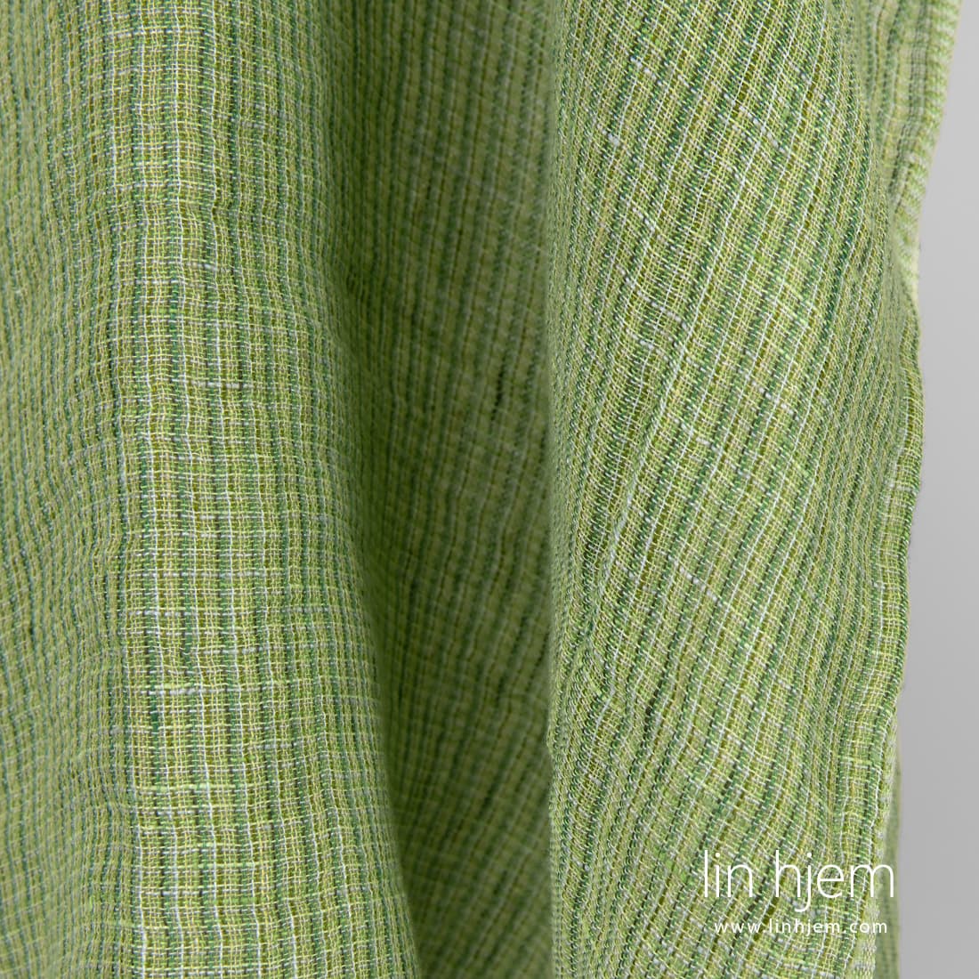 Rutete vasket grønt linstoff.