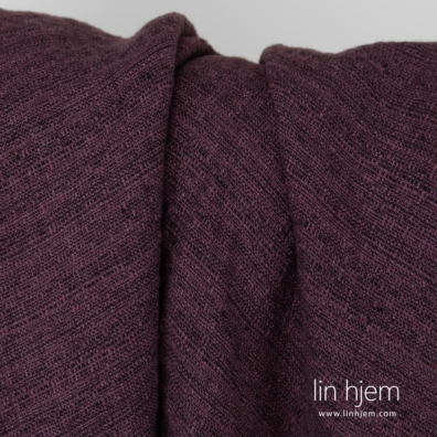 Lilla farget vasket linstoff.