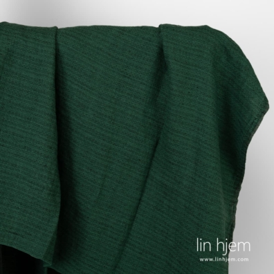 Vasket grønt-svart linstoff.