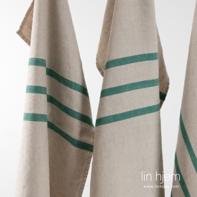 Grønt stripete håndkle.