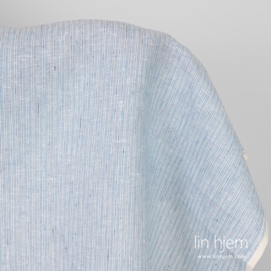 Stripete linstoff i lyseblå striper.