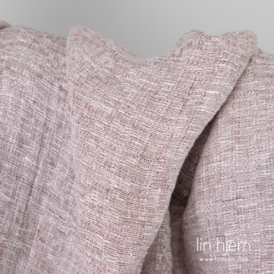 Melange vasket mønstret brunt linstoff.